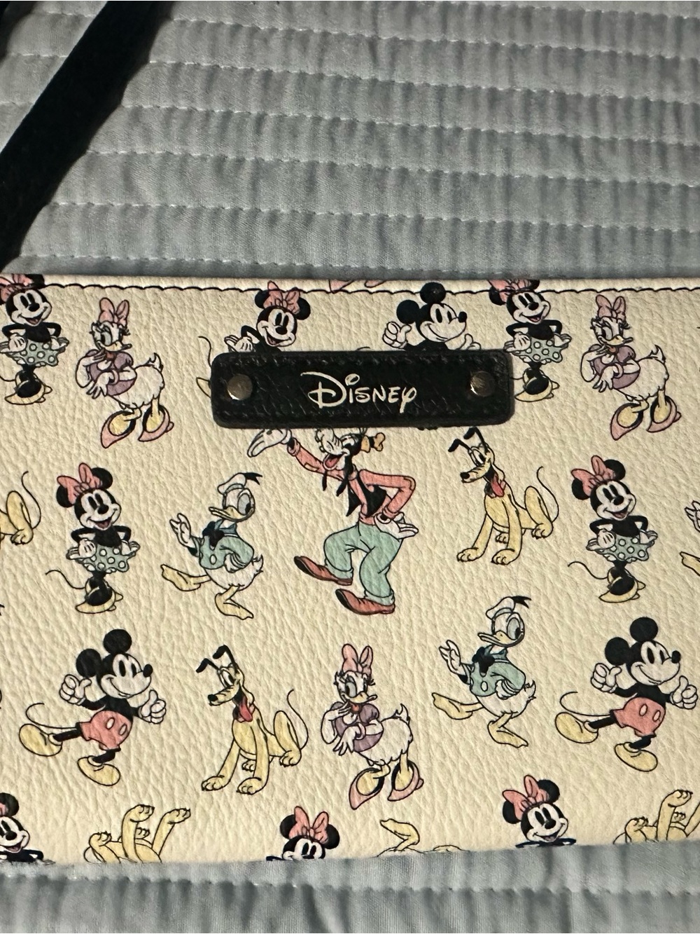 Disney Cream Multi-Character Wristlet with Pink and Yellow Accents
